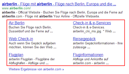 Expanded sitelinks (marked red) for the example search request 